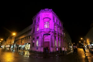 HSBC lit up in purple light during Light Up Cheltenham