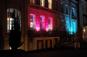 Knight Frank and Cotswold Transport Planning buildings lit up in blue and pink lights